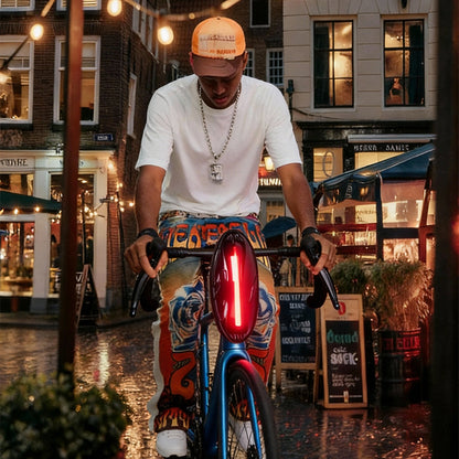 SCT-2 smart LED riding bag mounted on scooter handlebar city night scene
